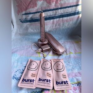 burst toothbrush in rose gold with case and 3 replacement heads